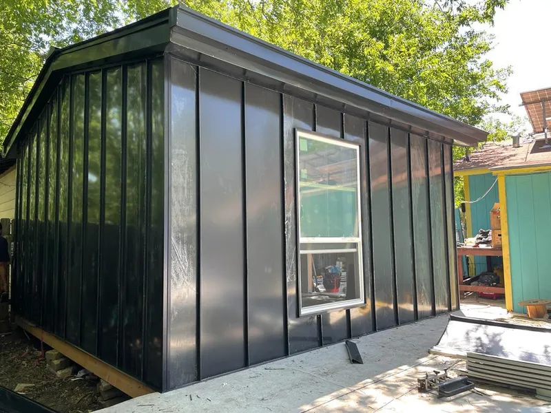 Black standing seam metal wall panels for Roof Inspection in Wellston