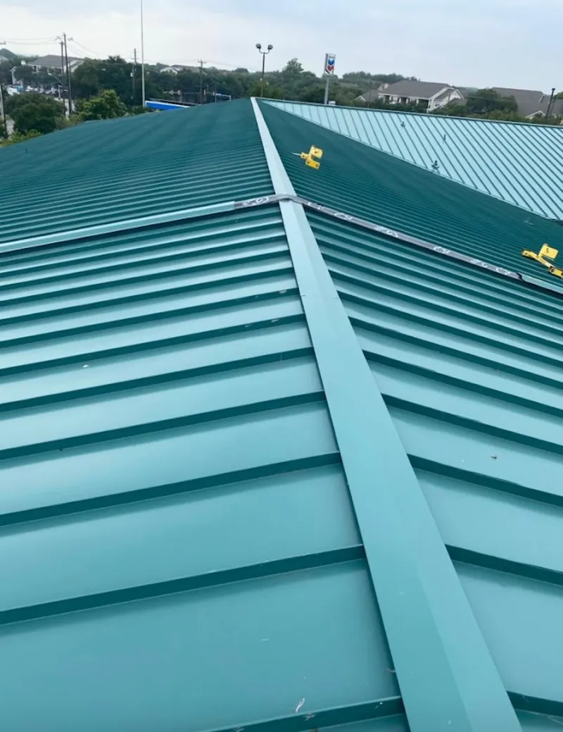 Green commercial metal roof ridge and valley for Metal Roof Repair in Wellston